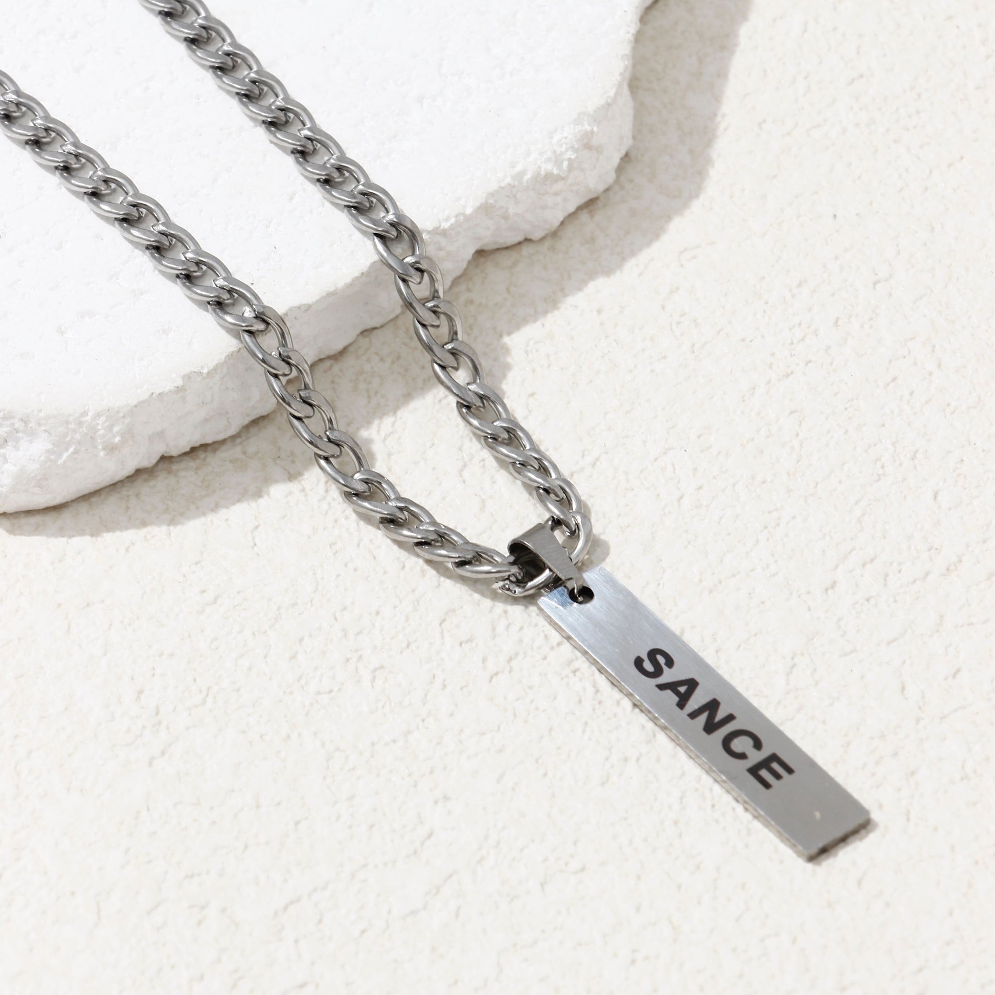 SANCE necklace silver thick chain long pendant for LGBTQ+ singles gay lesbian queer trans bisexual collar plata largo grueso solterxs solteros solteras lgbtq+ lesbiana gay homosexual white background