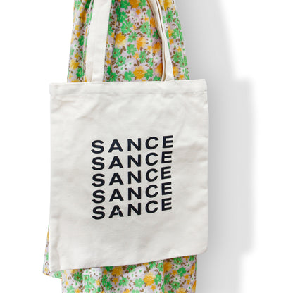 SANCE Tote Bags cream repeat logo LGBTQIA singles solterxs solteras solteros gay lesbian queer trans bisexual dating in real life