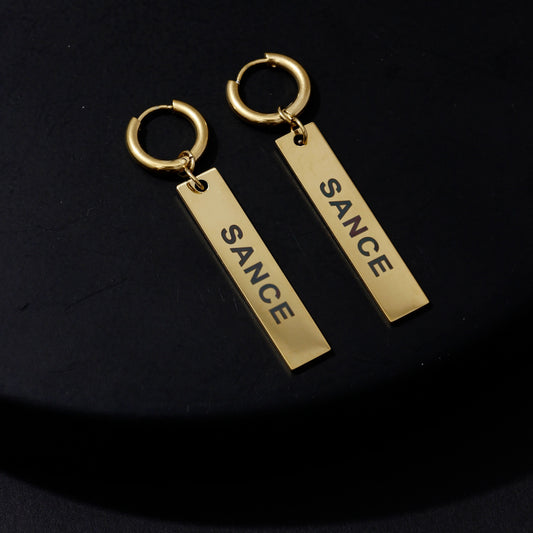 SANCE pendientes largas earrings long pendant gold oro queer bisexual gay lesbiana trans lgbtq+ lqbtia solterxs solteros solteras singles jewlry joyeria jewellery
